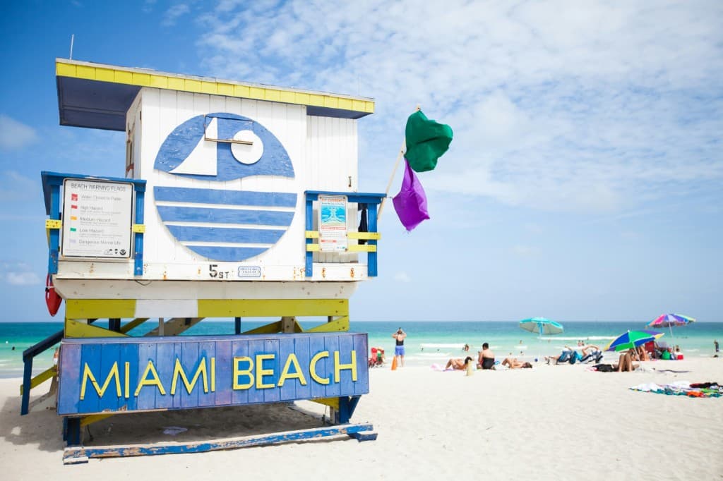 Ocean Drive in Miami Beach with Art Deco hotels, palms, and bike lane